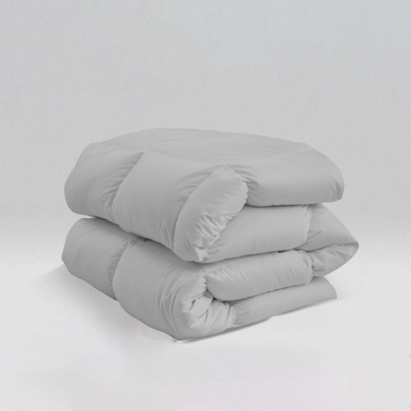 What is the difference between a down comforter and a down duvet?